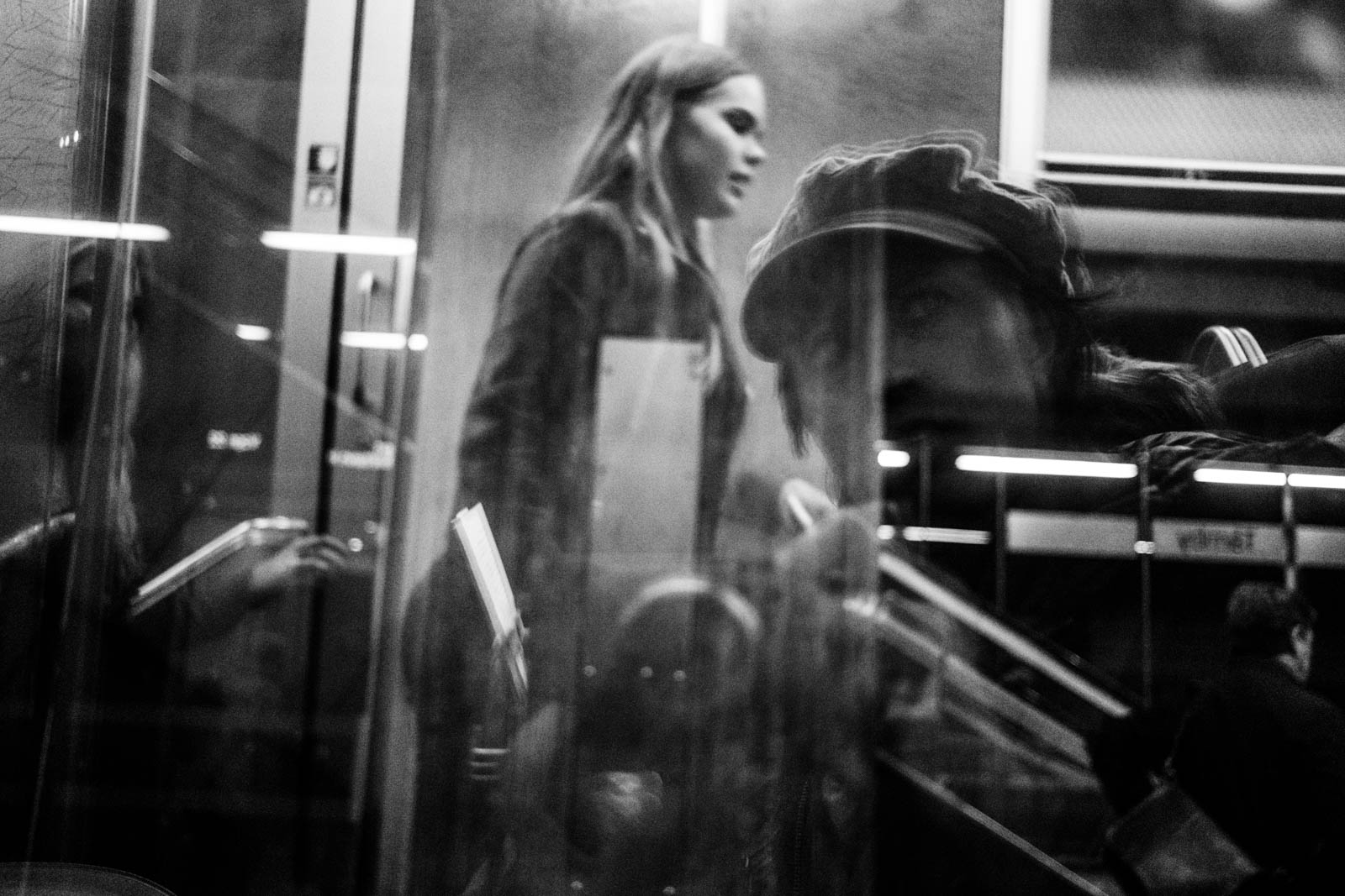 Self portrait with a stranger, on the train somewhere in Malmö, Sweden.