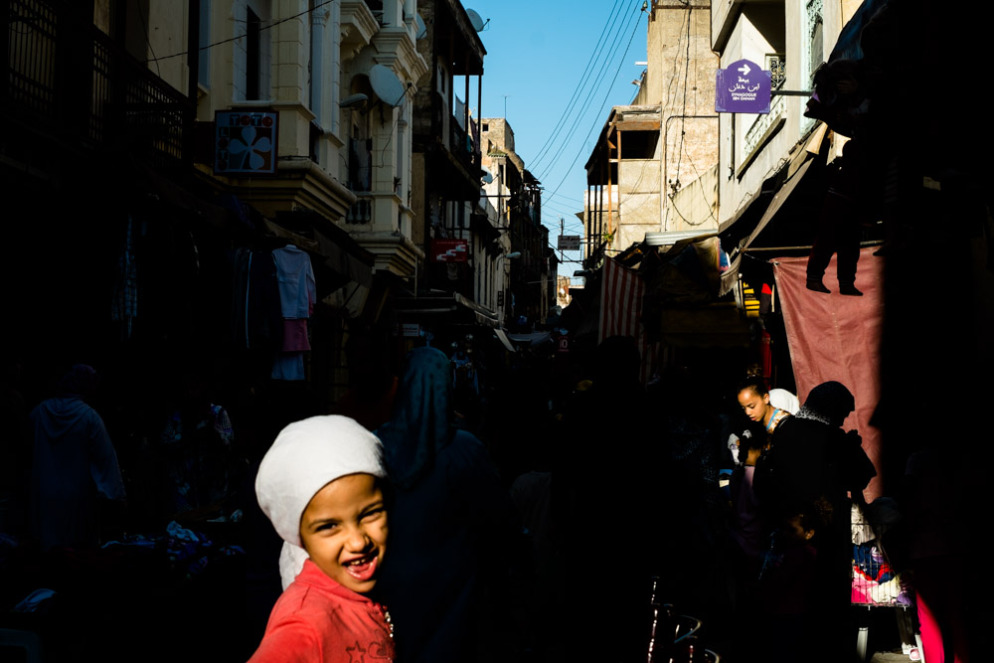 A child skips down the street in Melha. Fes, Morocco, September 2013