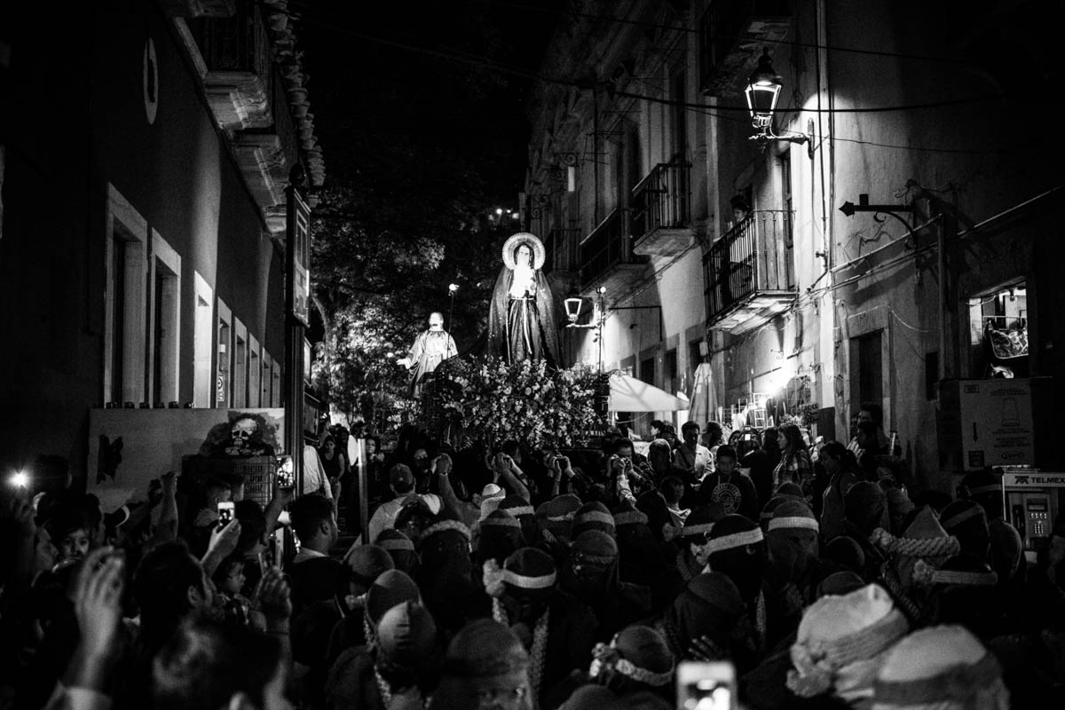 Our Lady of Solitude on her float, Jesus and the Virgin Mary follow close behind.