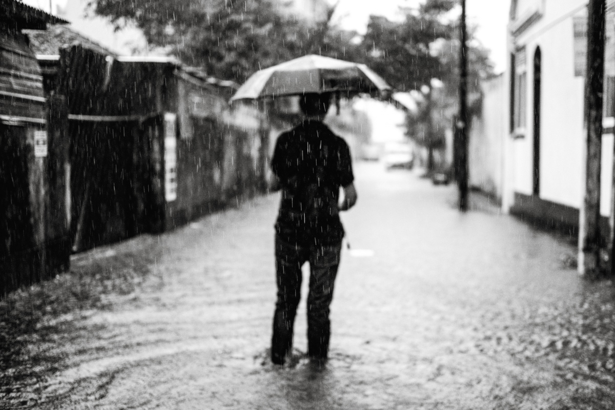 Wading through the river that is usually the laneway to our apartment in Colombo