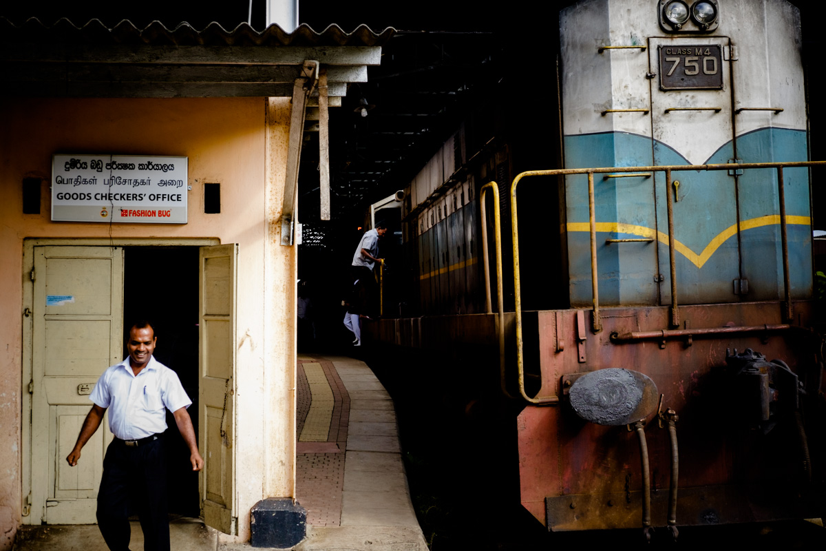 Drivers change shifts at Colombo Fort station.
